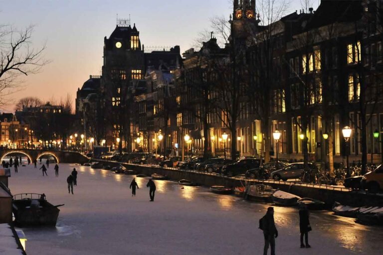 Skating on the frozen Amsterdam canals at night.